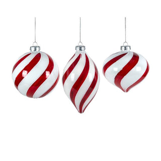 Three assorted red and white swirl ornaments