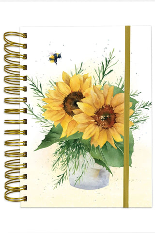 Notebook with sunflower design on a white background