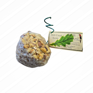 Bird seed mix in an acorn-shaped container with a label on a white background