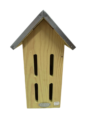 Wooden birdhouse with a gray roof on a white background