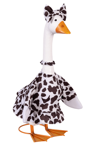 Plush toy goose with cow print pattern on a white background