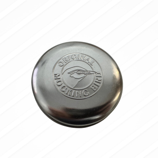Metallic cap with 'Original Mocking Bird' branding on a white background