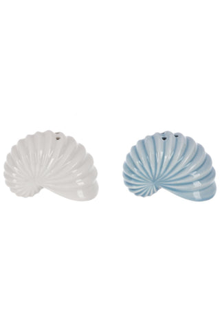 Two shell-shaped ceramic containers, one white and one blue, on a white background.