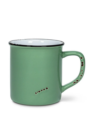 Green mug with black rim and decorative handle on a white background