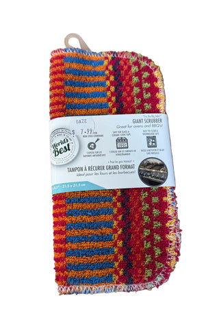 A colorful scrub brush with a label indicating it is a 3-in-1 eco-friendly scrubber and cleaner, suitable for various cleaning tasks.