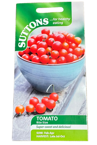 Suttons tomato seed packet on a wooden surface