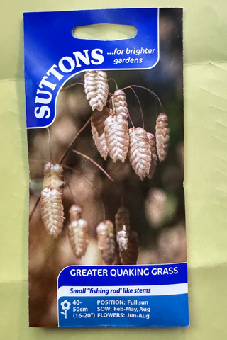 Suttons Greater Quaking Grass seed packet on a textured green background
