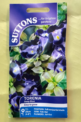 Suttons torenia seed packet on a textured beige background