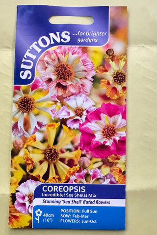 Suttons coreopsis seed packet on a textured beige background
