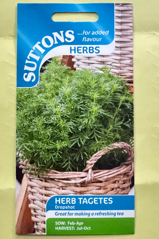 Suttons Herb Tagetes seed packet on a textured yellow background