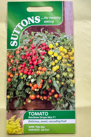 Suttons tomato seed packet on a textured beige background