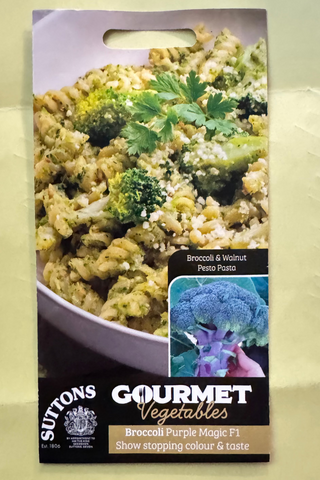Packaging of Suttons Gourmet Vegetables with broccoli and cauliflower on a beige background