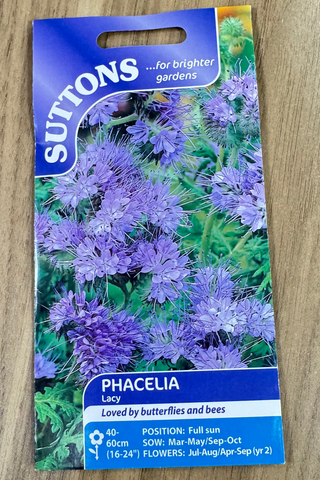 Suttons Phacelia seed packet on a wooden surface