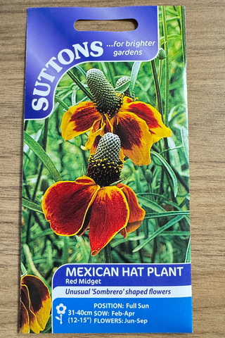 Suttons Mexican Hat Plant seed packet on a wooden surface