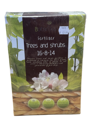 A package of Botanika brand tree and shrub seeds for planting dates 16-8-14, weighing 2KG, with a green and white packaging featuring images of various trees and shrubs.