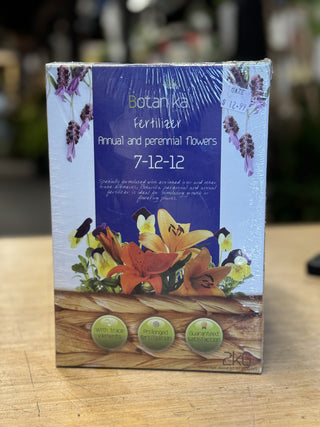Packaging of Botanika brand annual and perennial flowers, featuring images of various colorful flowers and the text 'Annual and Perennial Flowers' along with the date '07/11/2012'.