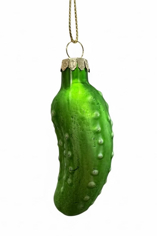 Green pickle-shaped ornament on a white background