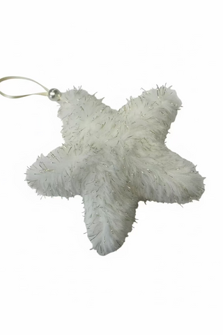 White fluffy star-shaped keychain on a white background