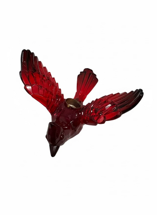 This image features a striking Cardinal Messenger Christmas Ornament. The ornament is crafted in the shape of a vibrant red and black cardinal, with intricate details that highlight its glossy, feathery texture.