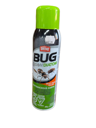 A bottle of Ortho Bgon Diatom insect repellent spray on a table with a green cap on a product that is labeled as 'BEGIN DIATOM' and has an image of a cockroach on the label.