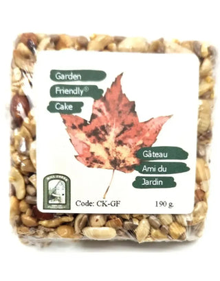 Packaged bird seed with a maple leaf on a white background