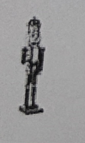 Nutcracker king holding a gold staff