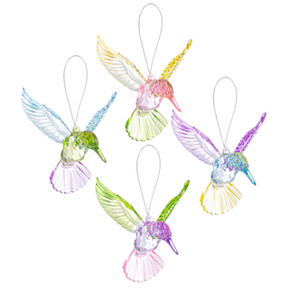 Set of four colorful hummingbird-shaped ornaments on a white background