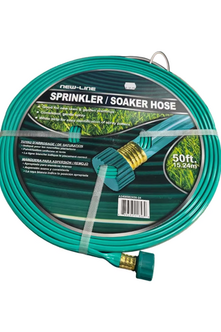 Green sprinkler soaker hose with packaging on a desk