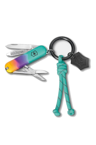 Multitool keychain with colorful handle and black key ring on a white background