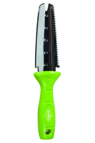 Fruit peeler with green handle on a white background