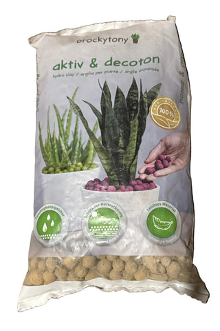 Package of 'aktiv & decorat' on a wooden surface