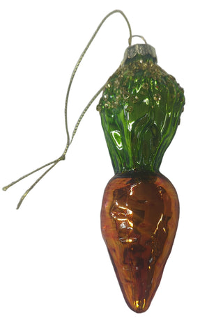 A glass carrot-shaped ornament with sequins, attached to a tag.